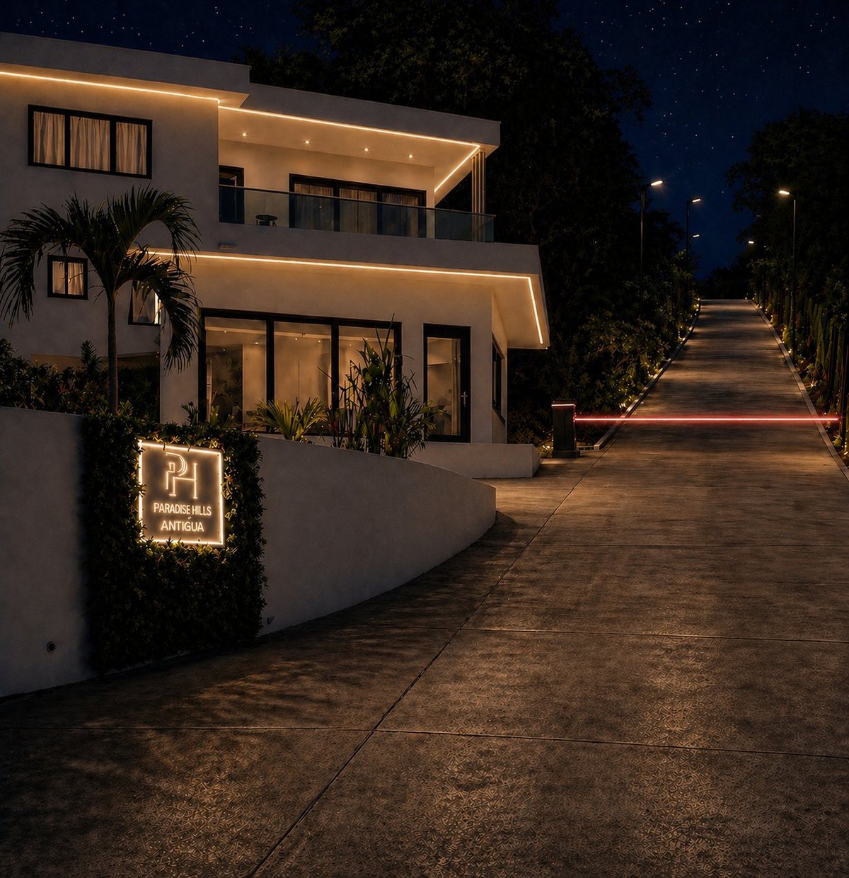 Modern white building with warm LED accent lighting at night, surrounded by tropical plants and paved walkway