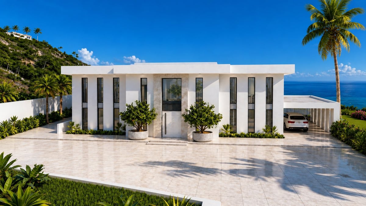 Modern white architectural house with ocean views, palm trees, and manicured landscaping on a hillside
